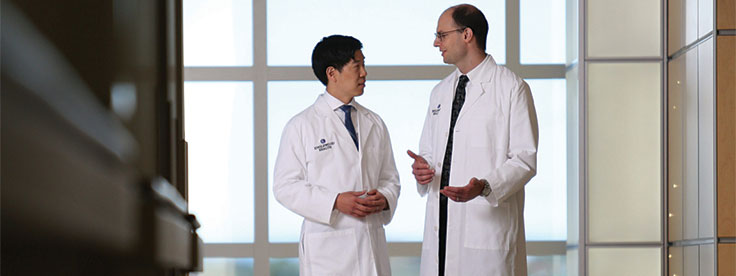 Hematologists/oncologists Brian Kim, MD, and Maxwell Janosky, MD.